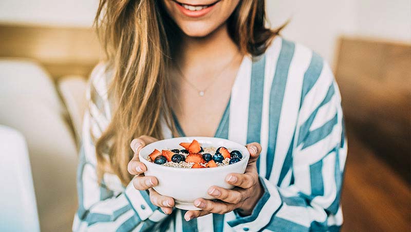 patient eating healthier after receiving advice from a Wilmington Chiropractor at Cowan Chiropractic & Rehabilitation