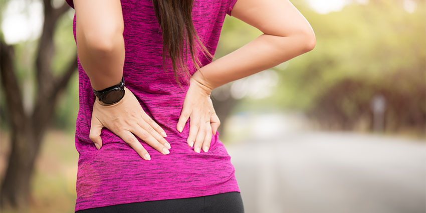 patient needing back pain chiropractor in Wilmington