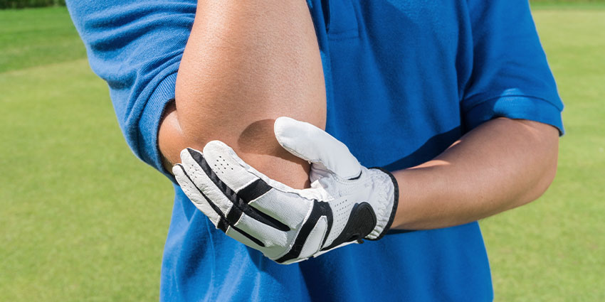 patient needing golfer's elbow chiropractor in Wilmington