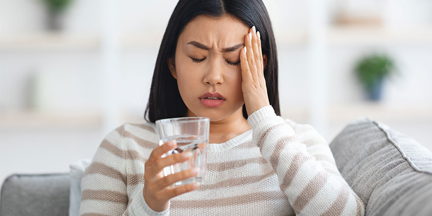 patient needing headache chiropractor in Wilmington