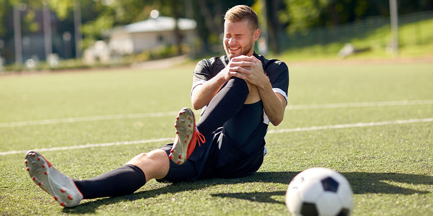 patient needing knee pain chiropractor in Wilmington