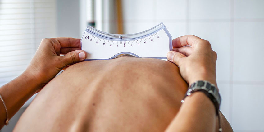 patient needing scoliosis chiropractor in Wilmington