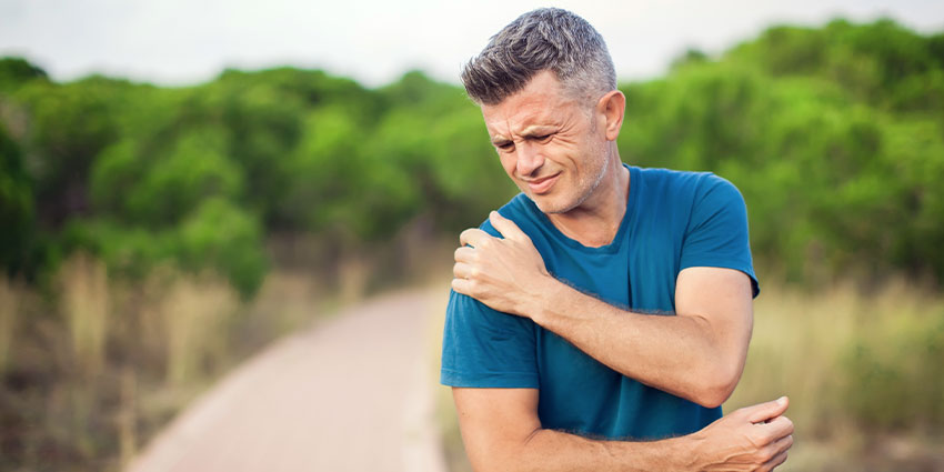 patient needing shoulder pain chiropractor in Wilmington
