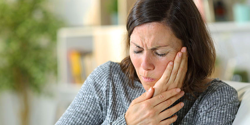 patient needing jaw pain chiropractor in Wilmington