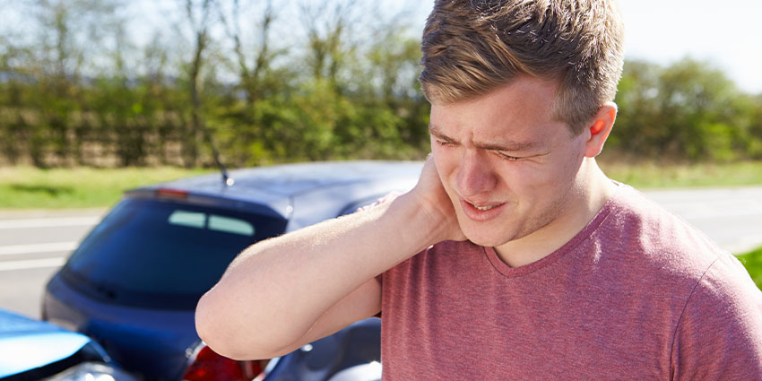 patient needing whiplash chiropractor in Wilmington