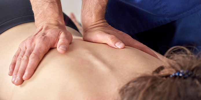 patient getting diversified chiropractic treatment in Wilmington