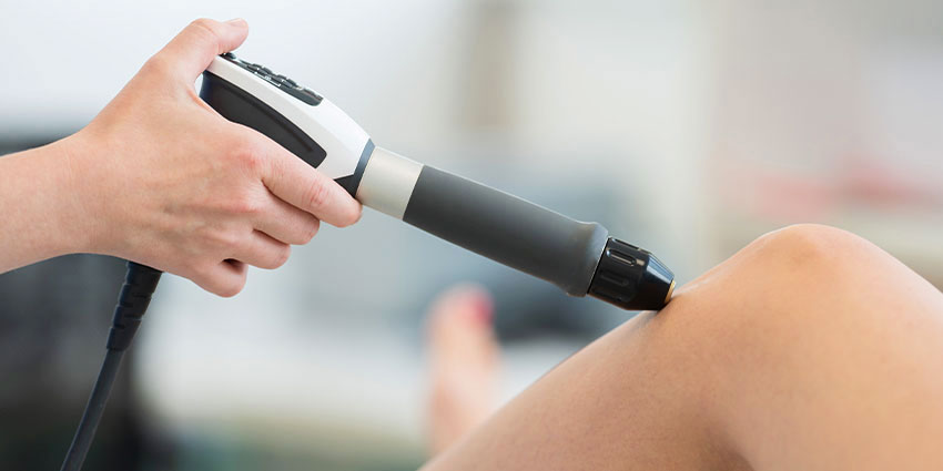 patient receiving shockwave therapy in Wilmington